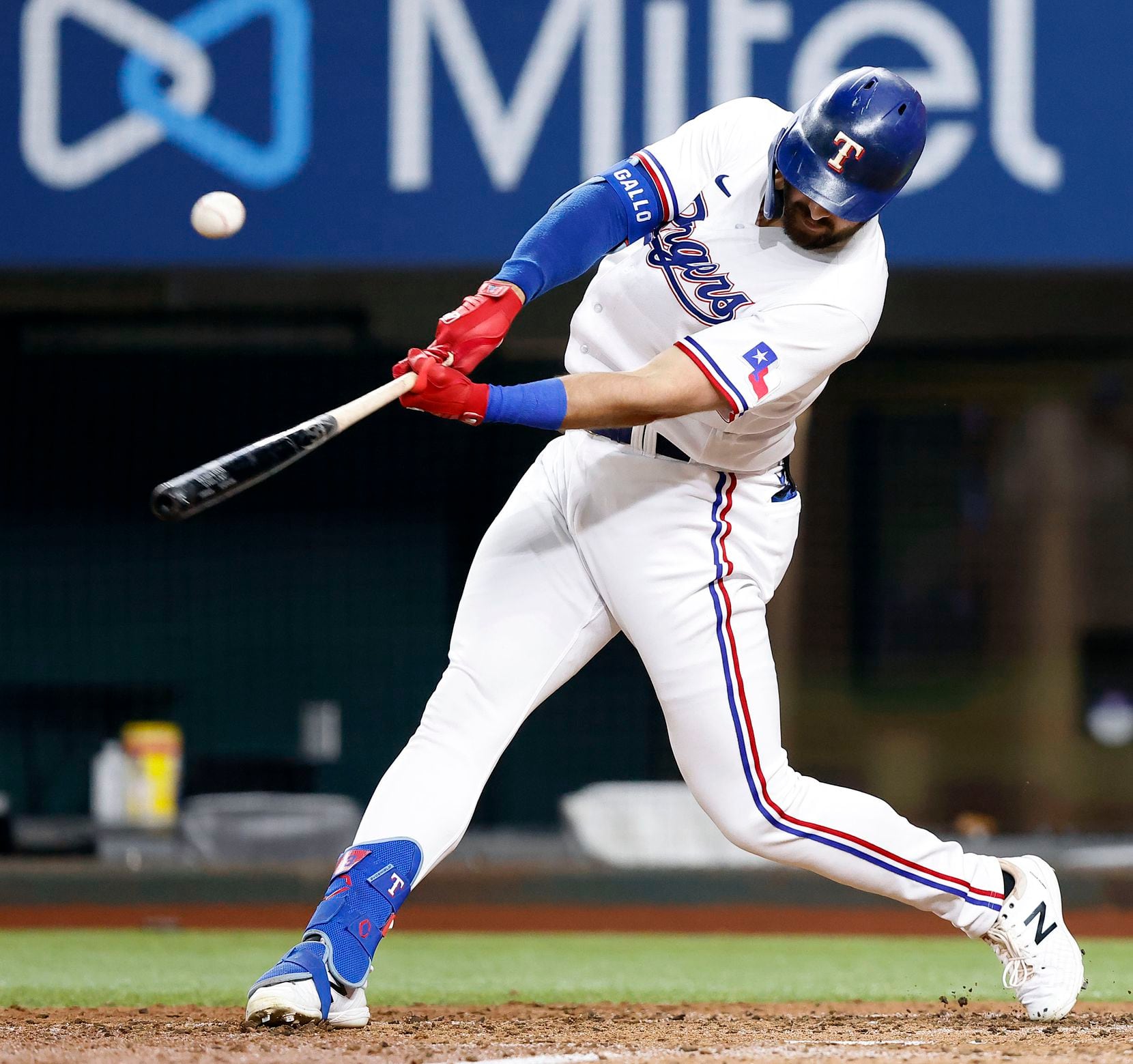 Texas Rangers center fielder Joey Gallo (13) connects on a double down the line against the...