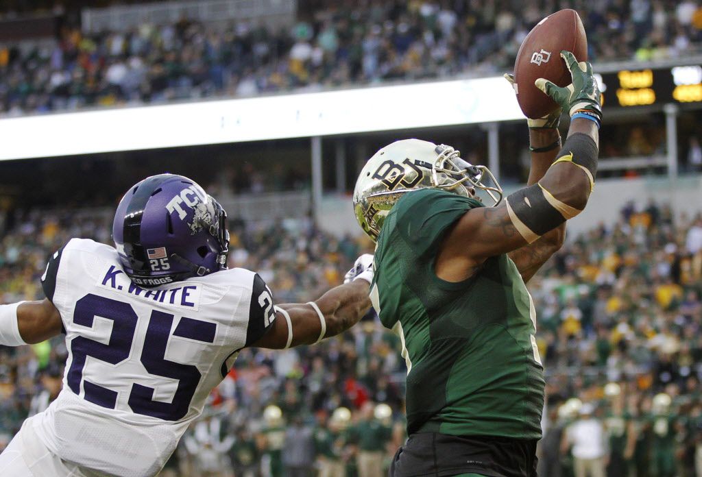 FILE - Baylor wide receiver Antwan Goodley (5) catches a pass for a touchdown during the second half of a game against TCU at McLane Stadium in Waco on Saturday, Oct. 11, 2014. (Vernon Bryant/The Dallas Morning News)