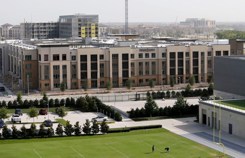 Station House apartments adjacent to the practice fields for the Dallas Cowboys at the...