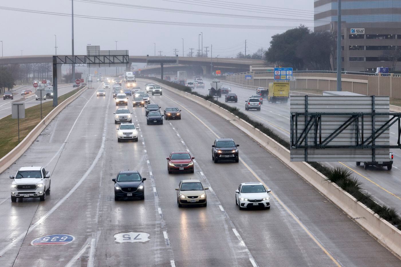 Motorists travel along U.S. 75 in Dallas, Monday, Jan. 30, 2023. North Texas is under a...