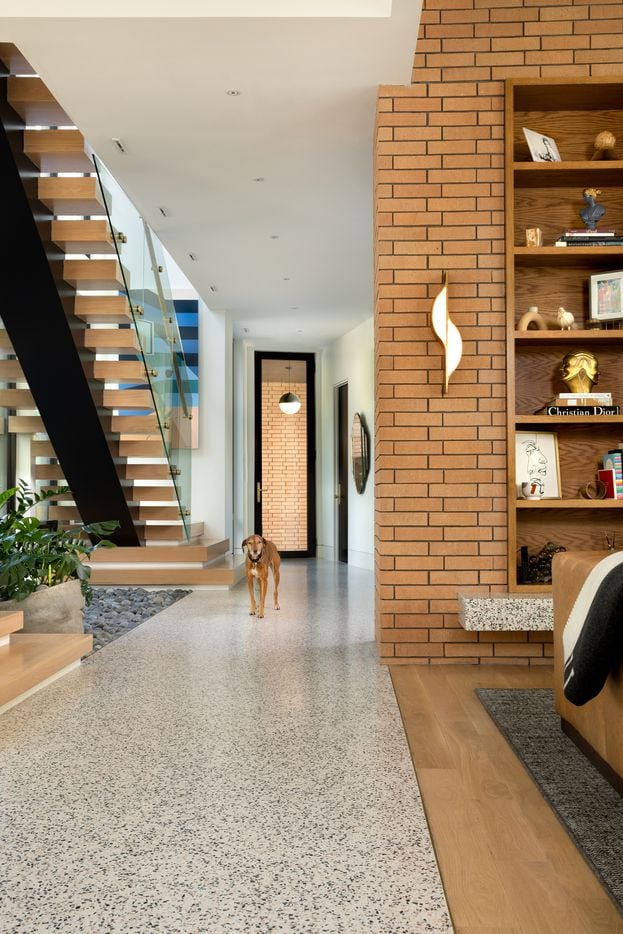 A custom-blended terrazzo was used for flooring in the entry and the hallway near the stairs.