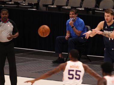 Dallas Mavericks owner Mark Cuban talks from the sideline in a game against the Phoenix Suns...