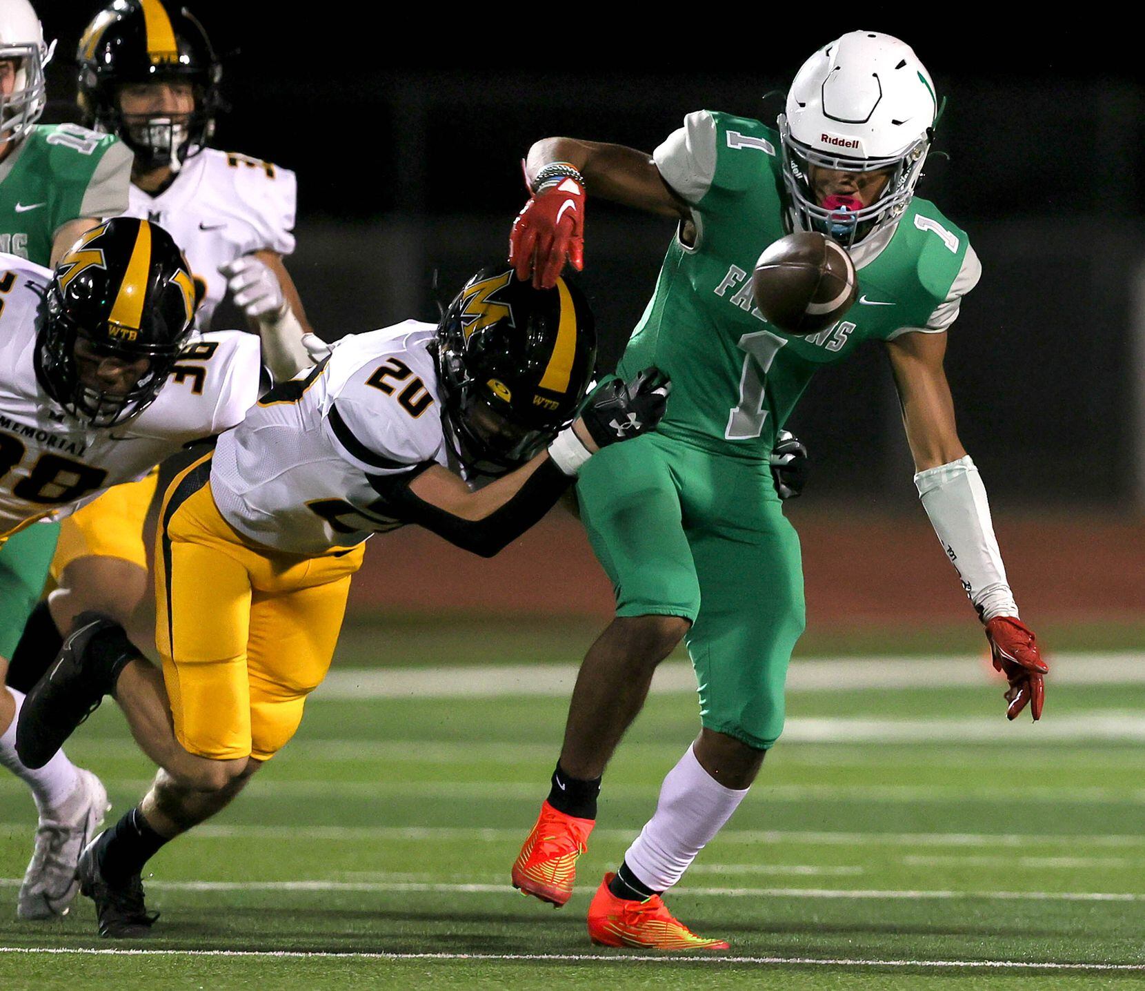 Lake Dallas wide receiver Niki Gray (1) gets stripped and fumbles the ball against Frisco...
