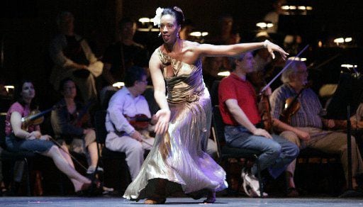 Melissa M. Young performs with the Dallas Symphony Orchestra during her tenure as a dancer...