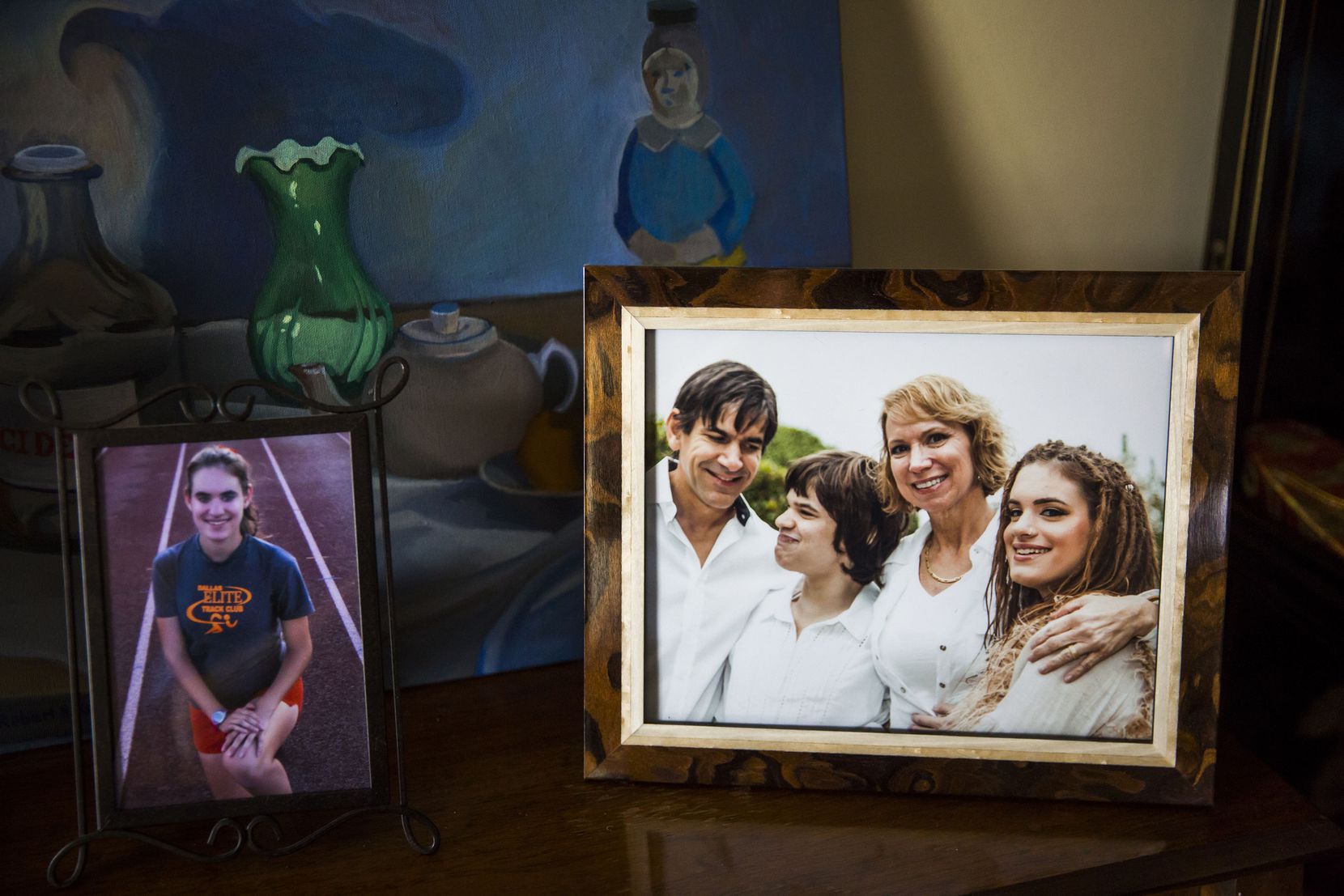 A framed photo in the family's home shows the Zartlers and their twin daughters. (Smiley N....