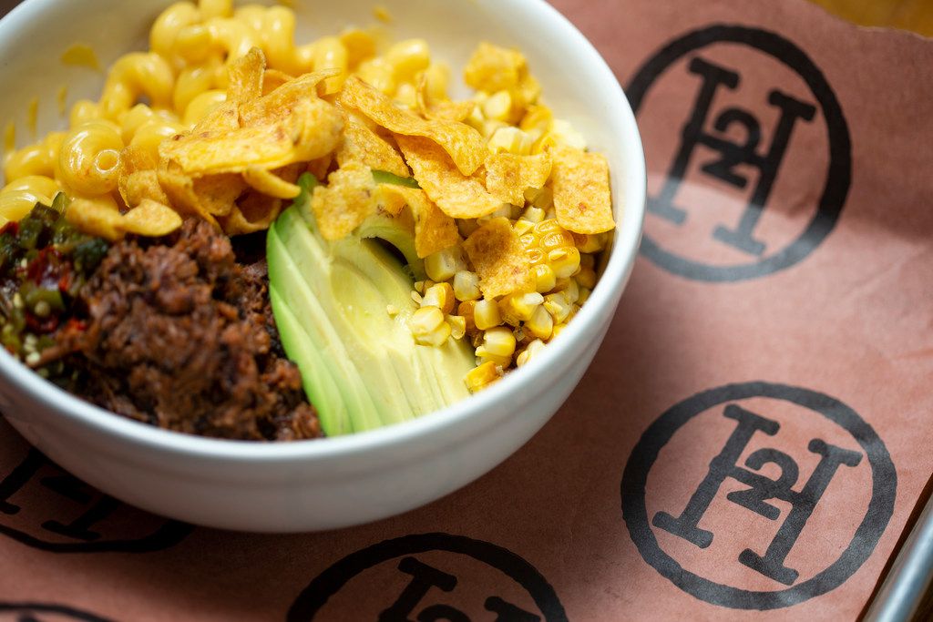 One example of H2Oak's loaded mac and cheese might come with brisket, Fritos, corn and avocado.