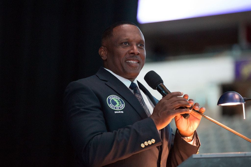 Pro Football Hall of Famer Tim Brown from Woodrow Wilson is inducted into the Dallas ISD Hall of Fame at American Airlines Center on Friday, May 4, 2018. (Allison Slomowitz/Special Contributor)
