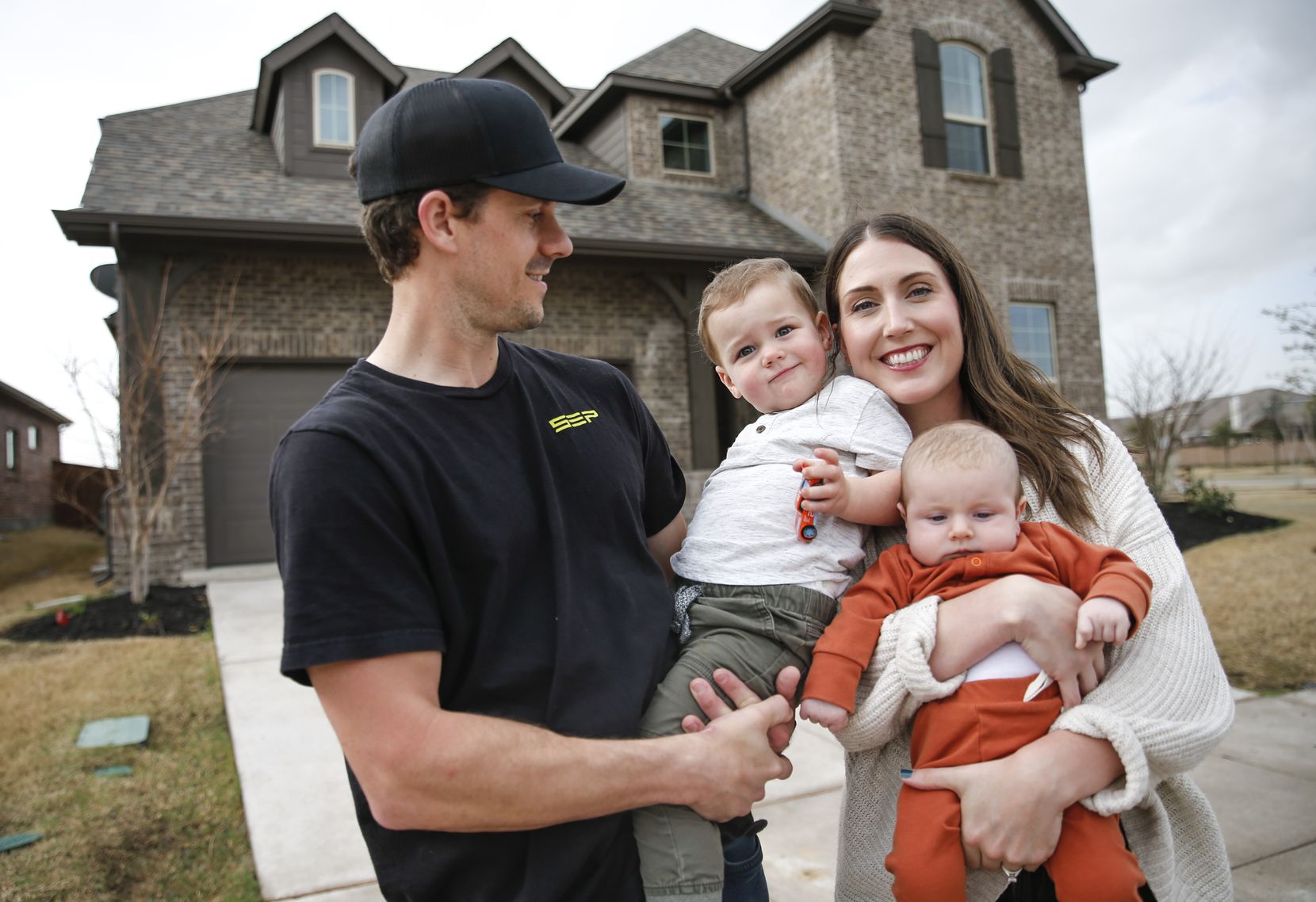 Riley Rosvold (left), oldest son Brooks, wife Amanda and their younger son, Baylor, moved to...