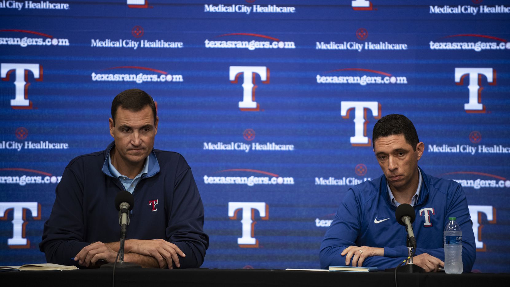 From left, Texas Rangers Executive Vice President and General Manager Chris Young and President of Baseball Operations Jon Daniels listen to a question from a reporter during the Texas Rangers' end of the year press conference at Globe Life Field on Wednesday, October 6, 2021 in Arlington, Texas.