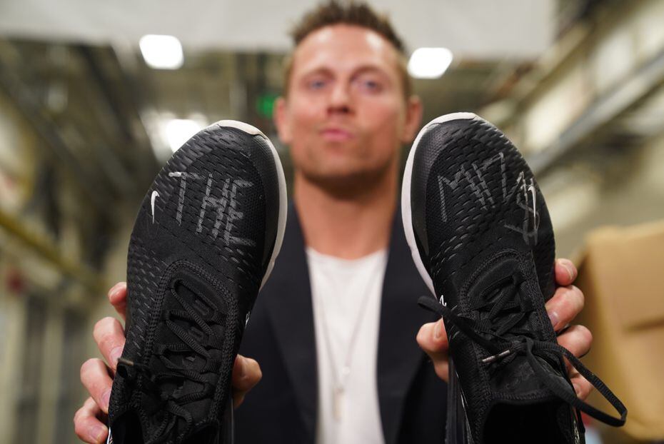 WWE's The Miz with his autographed shoes for the Soles4Souls Charity Auction.