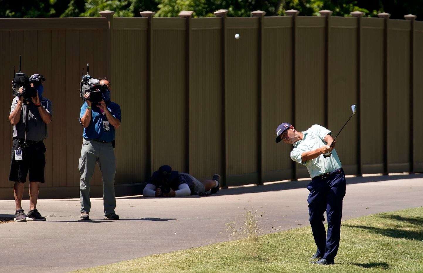 PGA Tour golfer Gary Woodland hit his tee shot over the trees near the back lot during the...