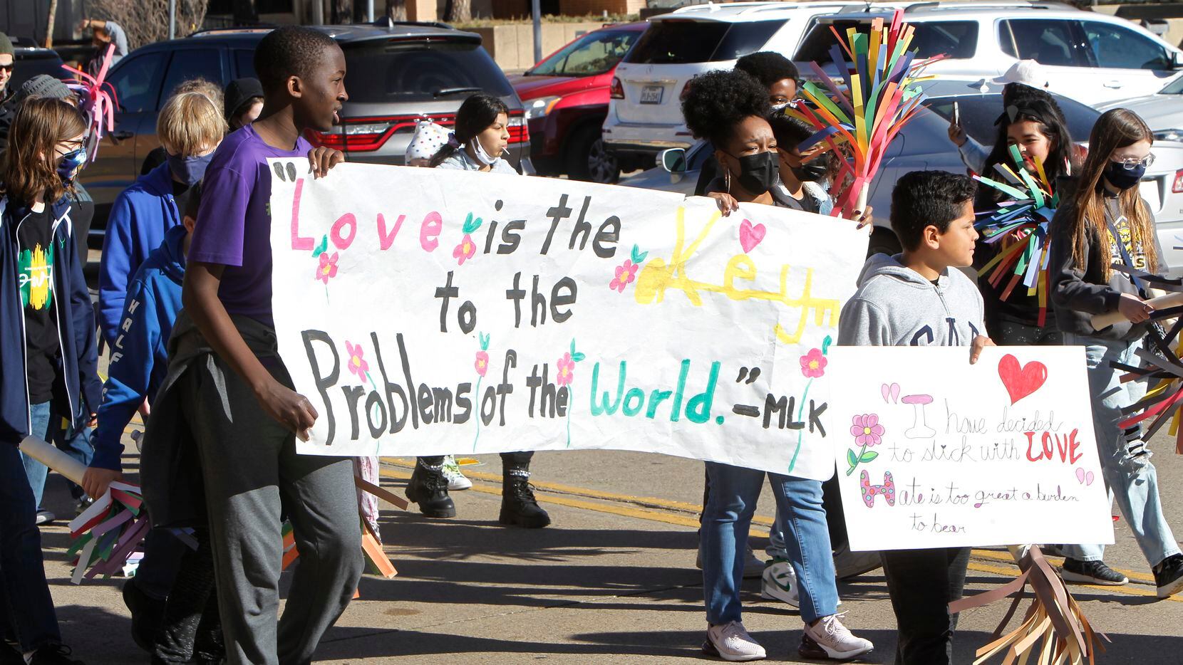 Students walk in a Grand Prairie parade honoring Dr. Martin Luther King Jr. 