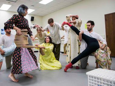 The Danielle Georgiou Dance Group runs through a piece called War Flower on Saturday,...