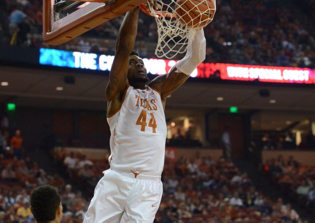 Texas Longhorns center Prince Ibeh (44) dunks against the Vanderbilt Commodores during the...