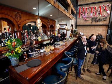The main floor of Reba’s Place showcases a restored antique bar that is more than 100 years...