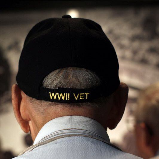 World War II veteran George Myron listens to a tour led by staff at the Dallas Holocaust...