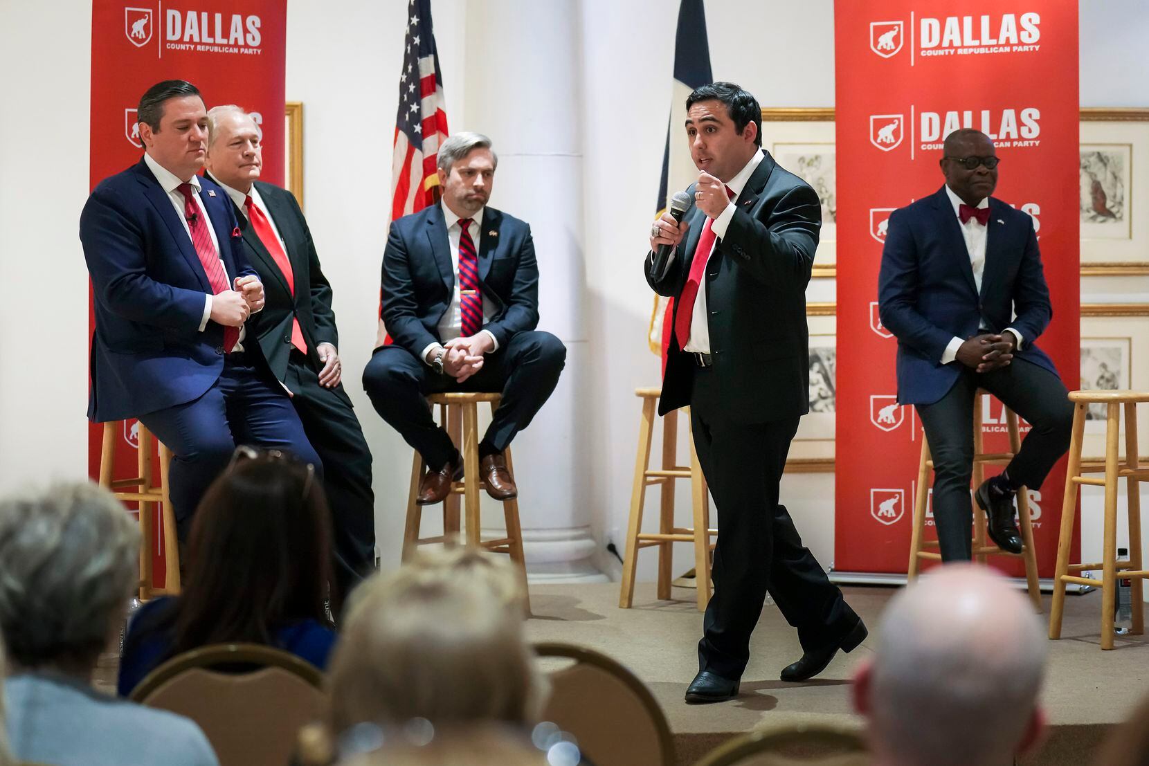 Brad Namdar answers a question during a forum for Republican candidates running for U.S. representative in the 32nd Congressional District of Texas at the Museum of Biblical Art on Feb. 9, 2022. Seated behind Namdar are (from left) Nathan Davis, Darrell Day, Justin Webb and Edward Okpa. Antonio Swad, another candidate, is not pictured.