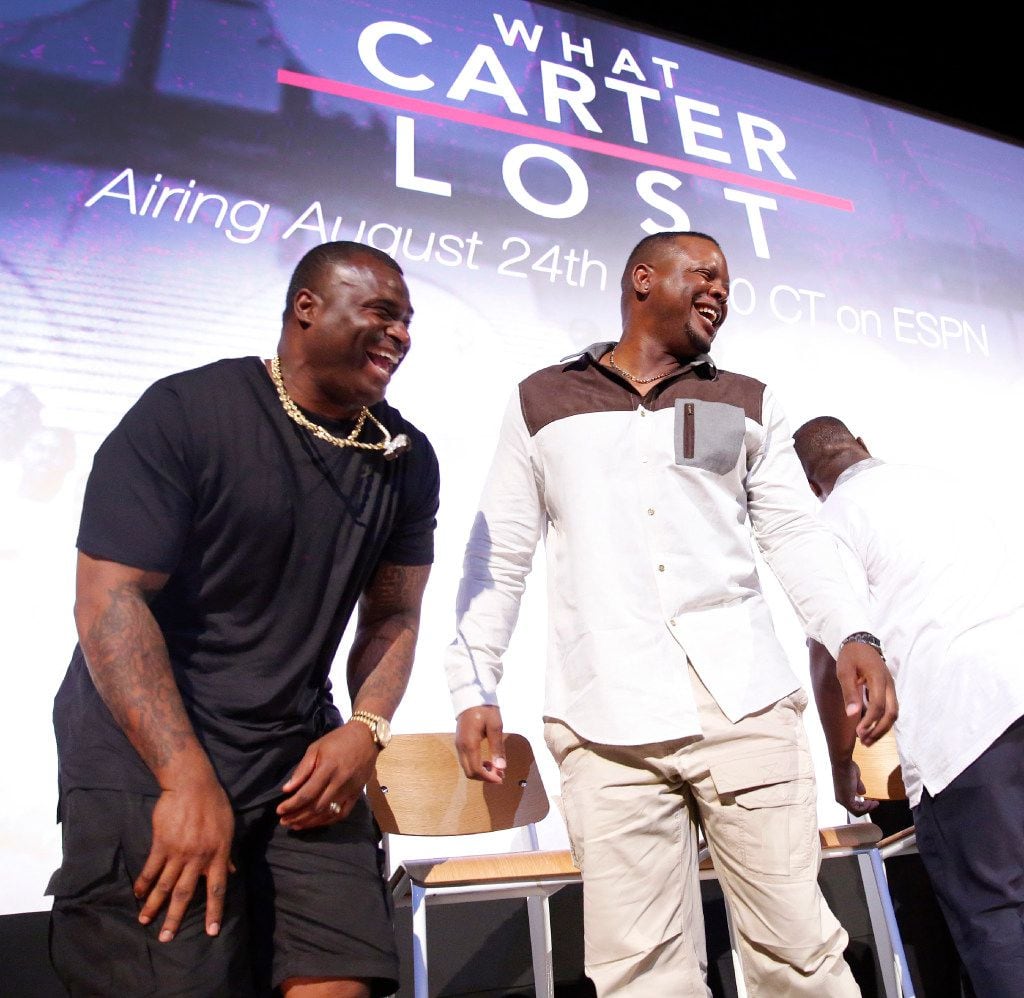 Former Carter High football players Jessie Armstead (left) and Derric Evans broke out laughing following a panel discussion and premier of What Carter Lost, an ESPN documentary about the 1988 Carter football team shown at the Texas Theatre in Dallas, Wednesday, August 16, 2017. (Tom Fox/The Dallas Morning News)