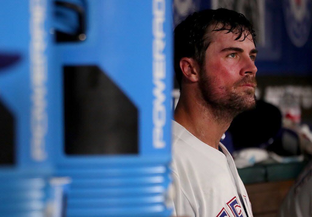 ARLINGTON, TX - AUGUST 30:  Cole Hamels #35 of the Texas Rangers reacts after reacts in the...