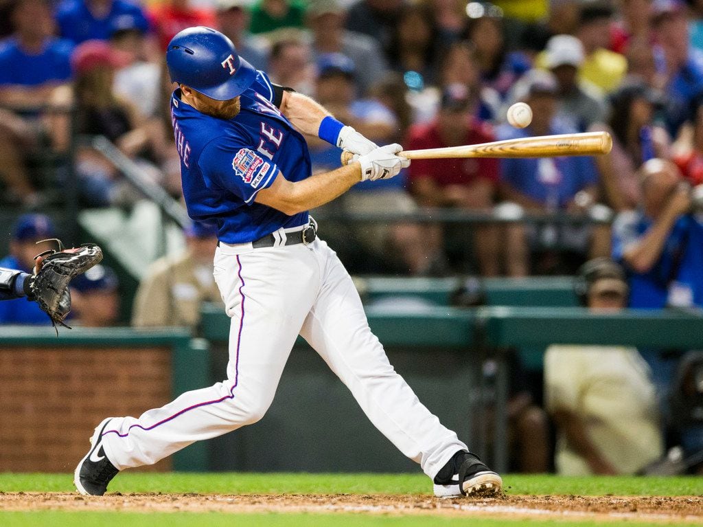 Texas Rangers short stop Logan Forsythe (41) bats during the fifth inning of an MLB game...