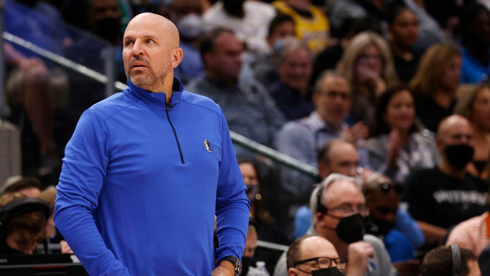 Dallas Mavericks head coach Jason Kidd looks up in between plays in a game against the Los...