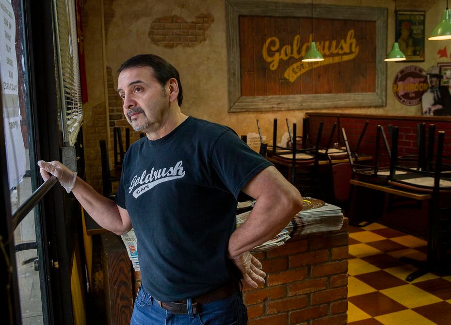 Goldrush Cafe owner George Sanchez looks outside his window on March 16, 2020. The...