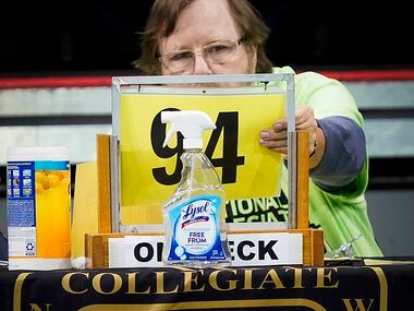 A bottle of disinfectant is seen on a scorers table during the NCWA national championships...