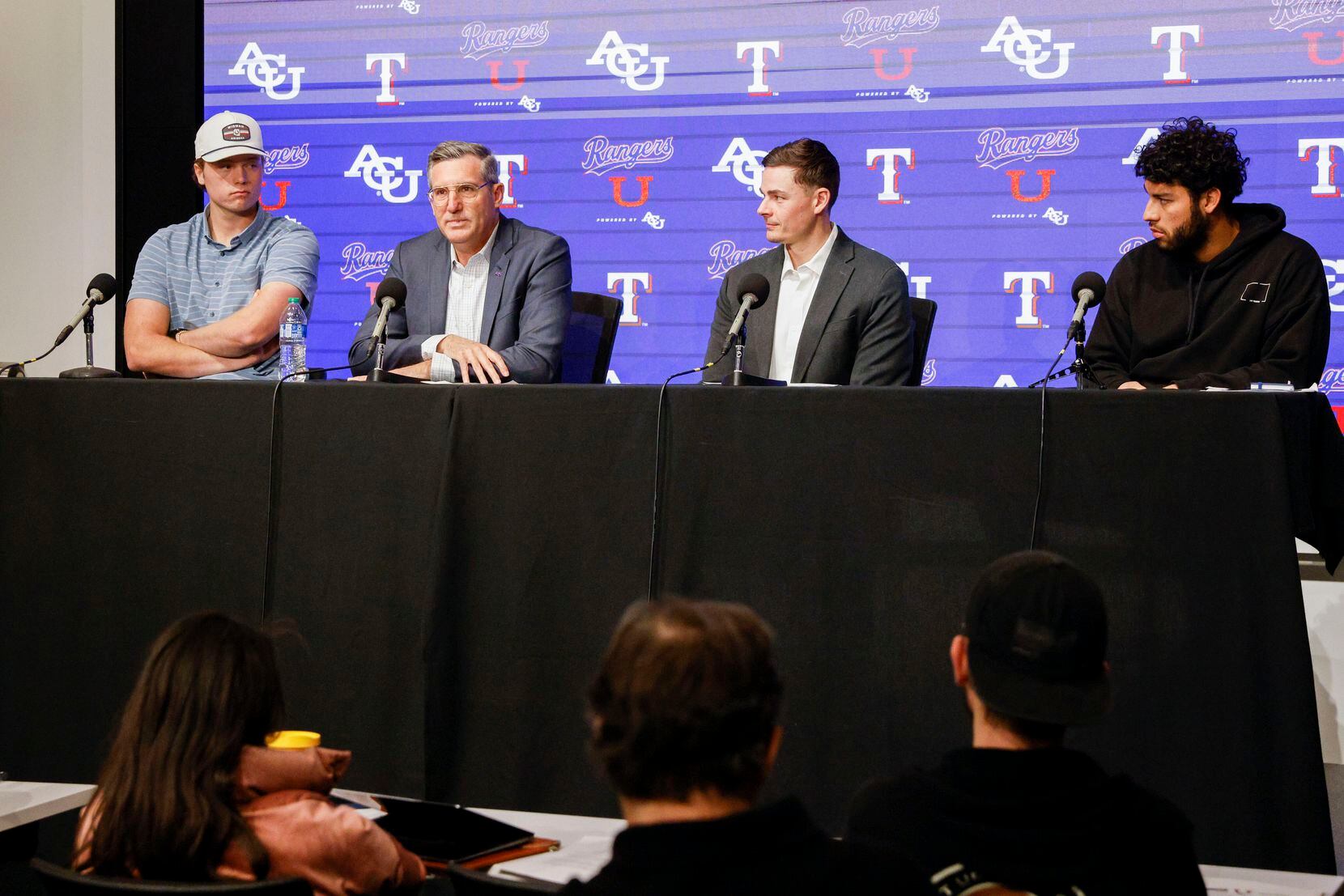 From left, Texas Rangers pitcher Tekoah Roby, Stephen Johnson, chief administrative officer...