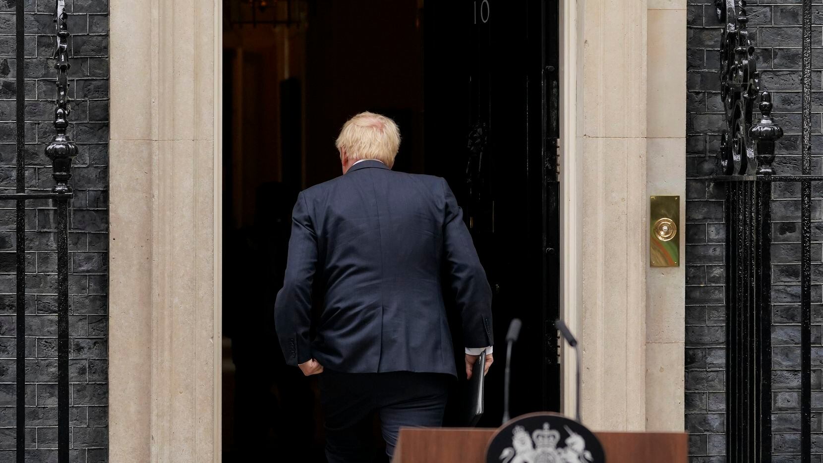 Prime Minister Boris Johnson enters 10 Downing Street, after reading a statement in London,...