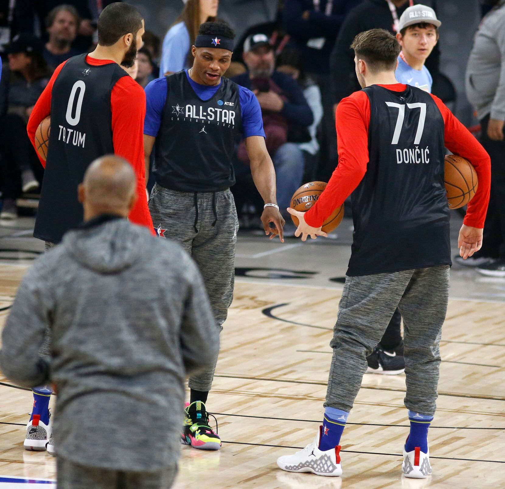 Team LeBron's Houston Rockets Russell Westbrook (0, center) points at Dallas Mavericks...