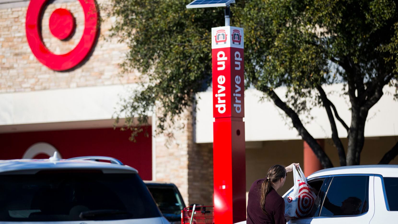Customers pick up online orders from the Medallion Center Target.