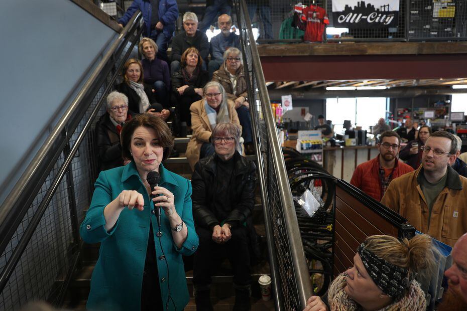 Sen. Amy Klobuchar speaks to an overflow crowd during a campaign stop at Crawford Brew Works on Feb. 1, 2020, in Bettendorf, Iowa.