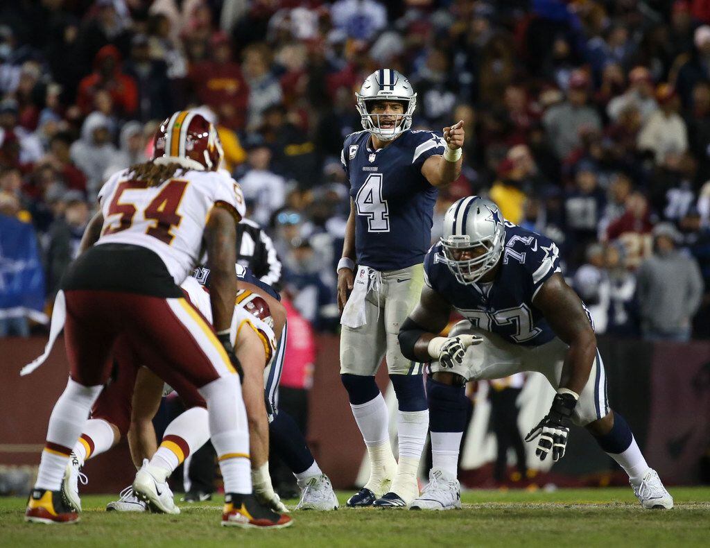 Dallas Cowboys quarterback Dak Prescott (4) calls out a play in the fourth quarter at FedExField in Landover, Maryland on Sunday, Oct. 21, 2018. The Dallas Cowboys lost 20-17.