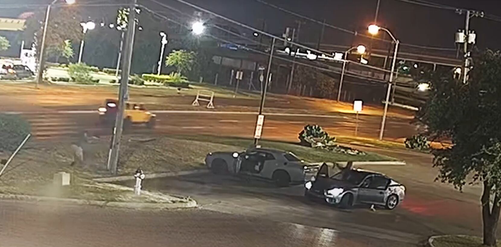 Surveillance footage shows Dallas police Officer Nathaniel Chapman trading fire with at...