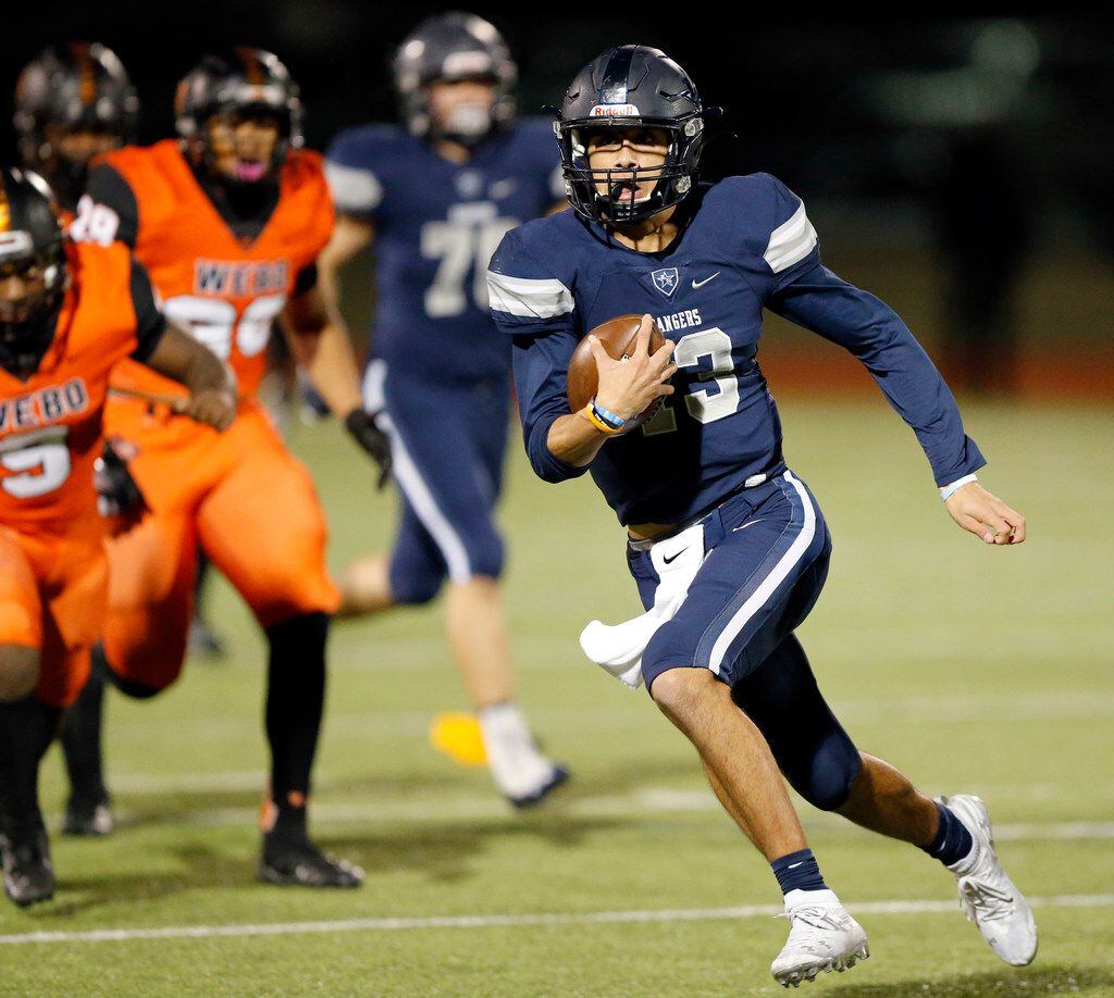 Frisco Lone Star quarterback Garrett Rangel (13) carries the ball against Lancaster during the first half of their Class 5A Division I Regional championship game at Wilkerson-Sanders Stadium in Rockwall, Texas, Friday, December 6, 2019. (Tom Fox/The Dallas Morning News)