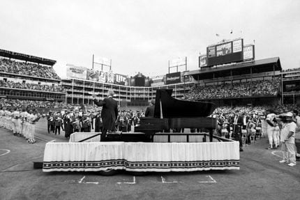 Watch: Nolan Ryan throws out Globe Life Park's final first pitch to Kenny  Rogers