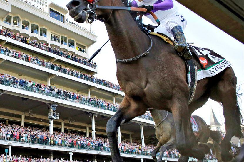 Mario Guitierrez rides Nyquist to victory during the 142nd running of the Kentucky Derby.