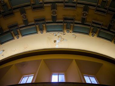 Paint chips on the ceiling from chilled water pipes are shown inside the historic Hall of...
