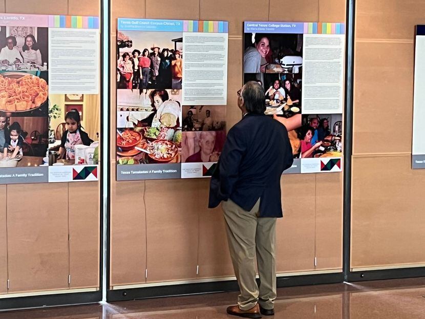 Armando Lopez reads an exhibit board at the Mexican American Museum of Texas' pop-up...