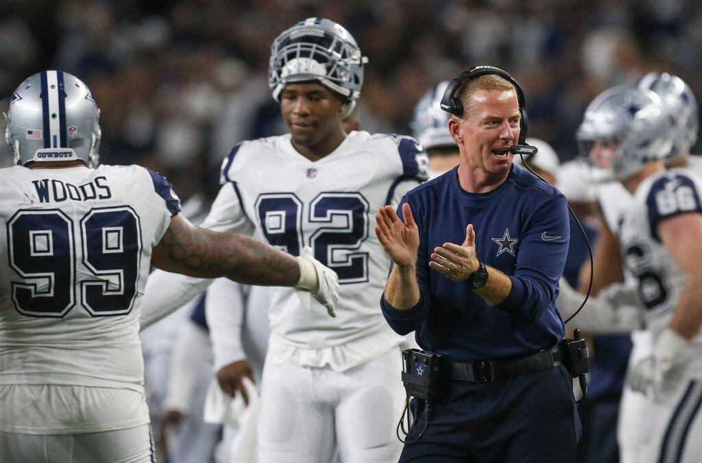 Dallas Cowboys head coach Jason Garrett celebrates as the Cowboys force a turnover on downs...