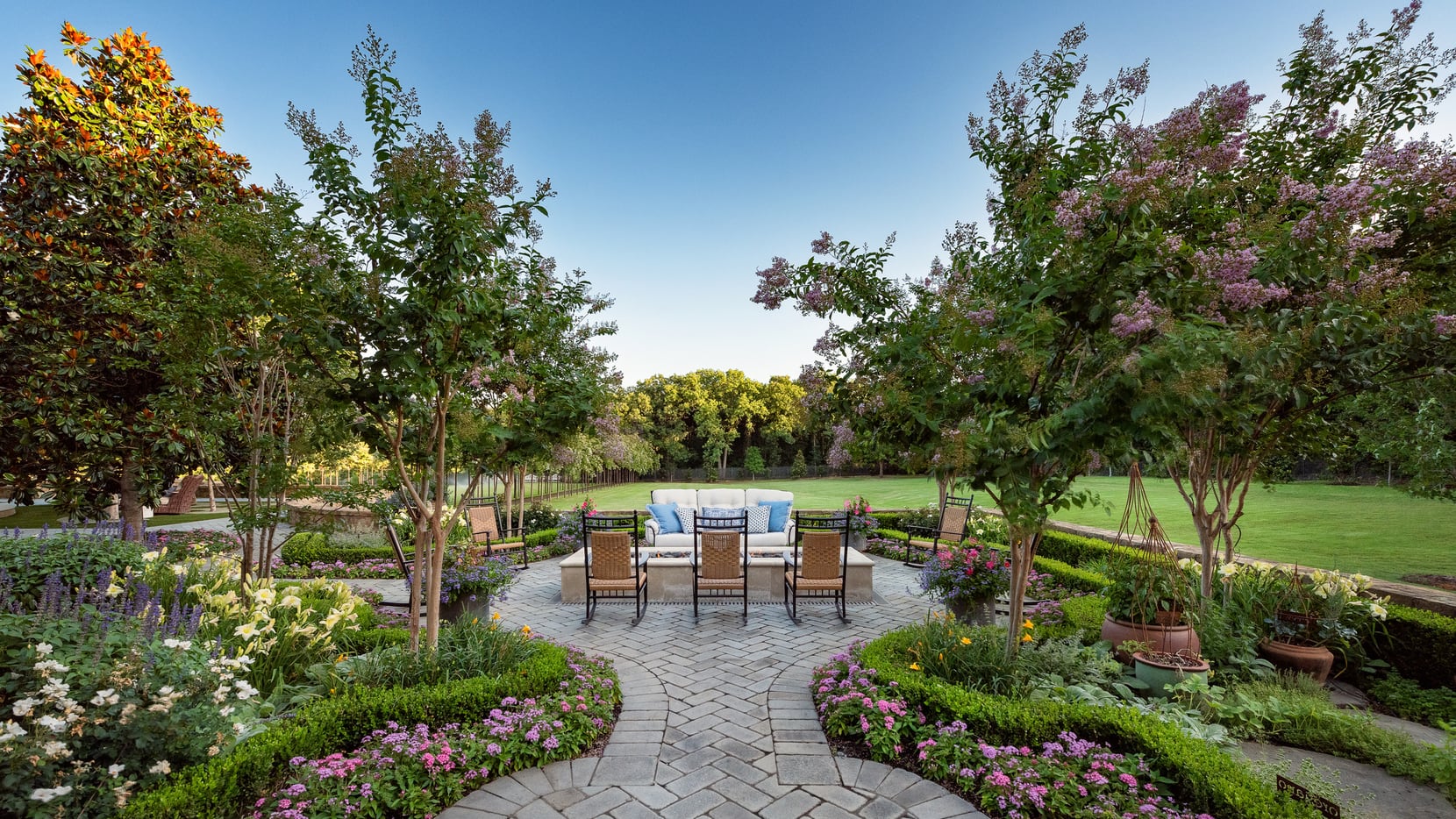 Formal garden with seating area