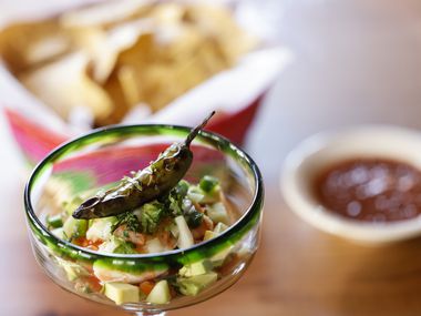 Mexican shrimp cocktail is one of several nostalgia Tex-Mex dishes at Odelay, which opened...