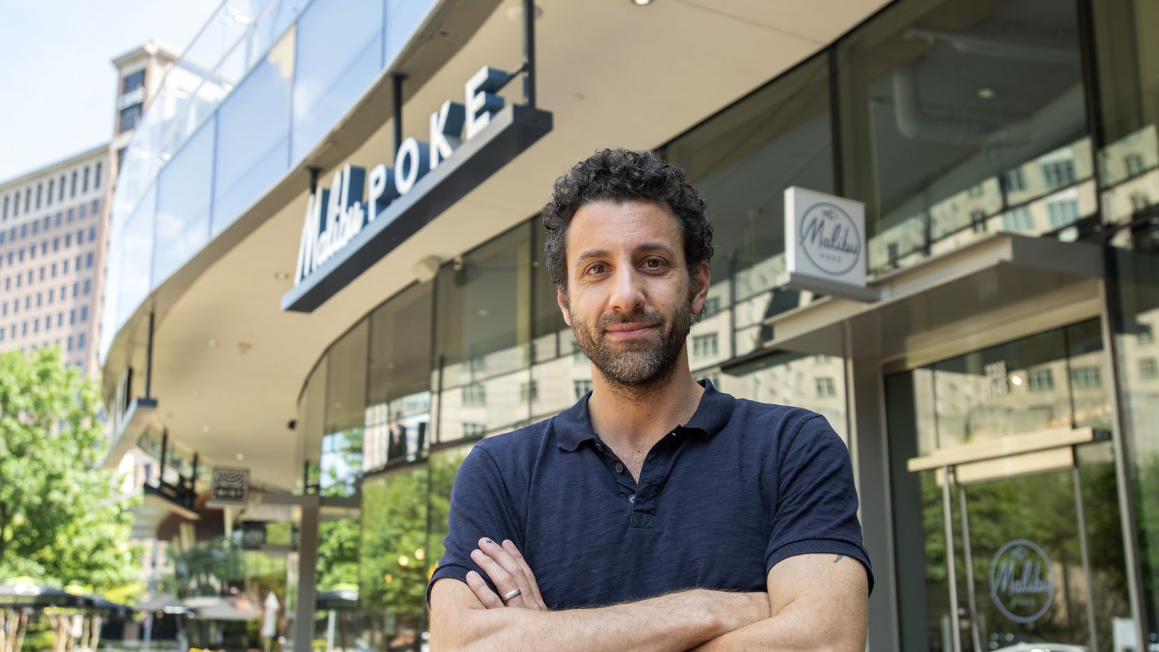 Jon Alexis, owner of TJ's Fresh Seafood and Malibu Poke, poses for a portrait outside one of his uptown restaurants on Tuesday, April 21, 2020 in Dallas.
