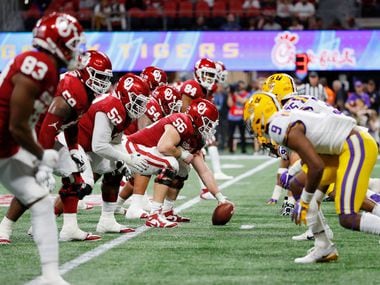 ATLANTA, GEORGIA - DECEMBER 28:  Creed Humphrey #56 of the Oklahoma Sooners prepares to snap the ball at the line of scrimmage against the LSU Tigers during the Chick-fil-A Peach Bowl at Mercedes-Benz Stadium on December 28, 2019 in Atlanta, Georgia. (Photo by Kevin C. Cox/Getty Images)