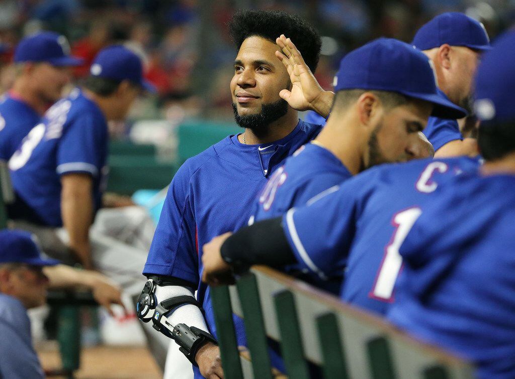 Texas Rangers shortstop Elvis Andrus (1) waves to fans during the seventh inning in a Major...
