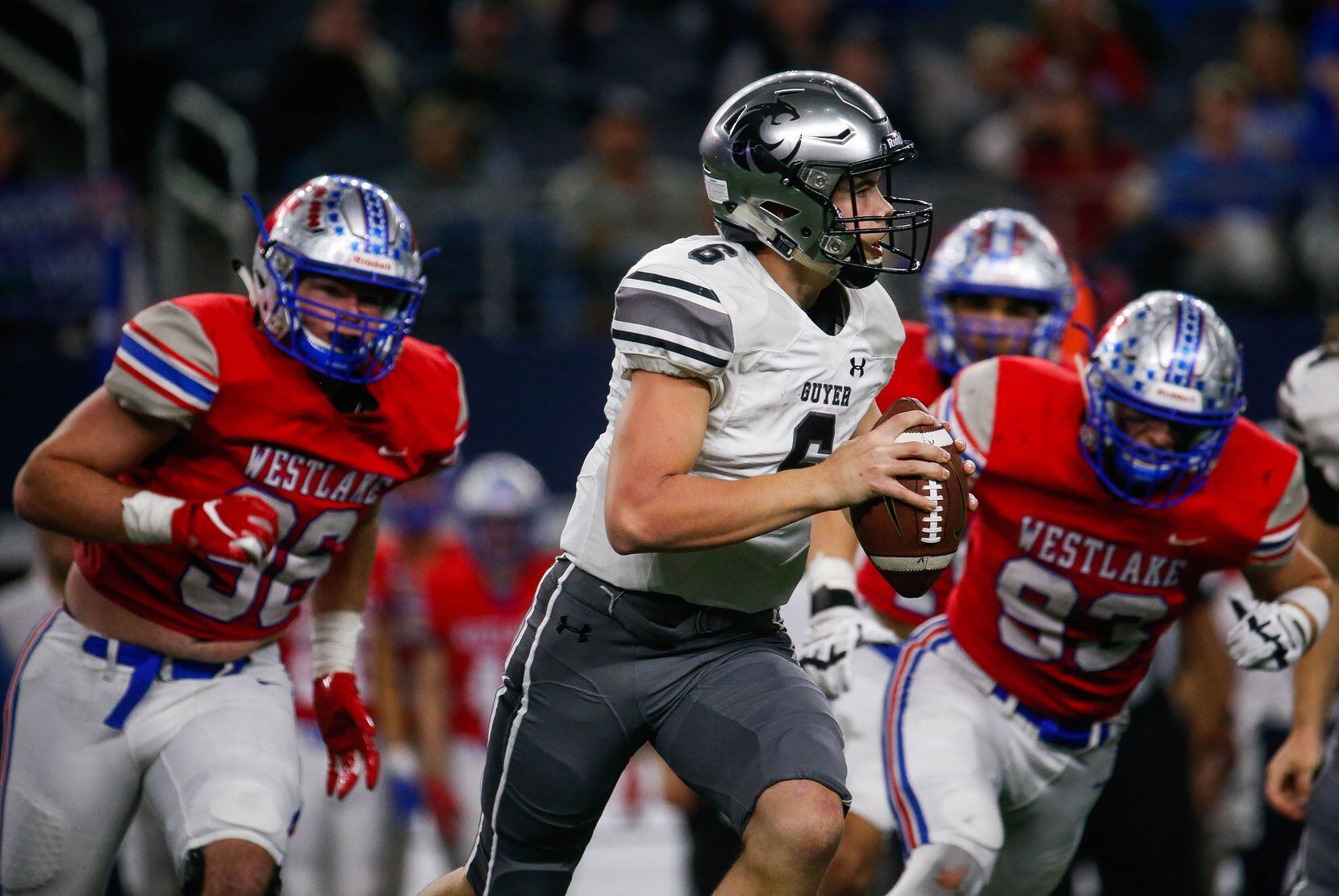 Denton Guyer's QB Jackson Arnold (6) is followed by Westlake's defense in the fourth quarter...