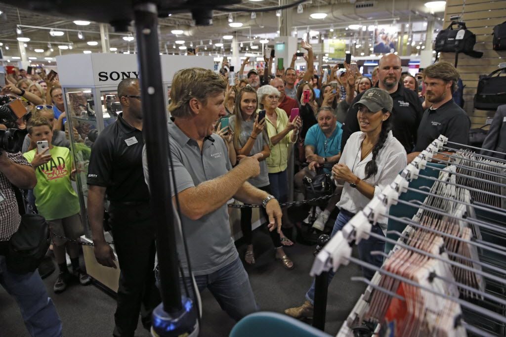HGTV stars from Waco, Texas, Chip and Joanna Gaines walk to the stage for an appearance at...