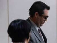 Richard Acosta walks into the courtroom during the first day of testimony in his capital...