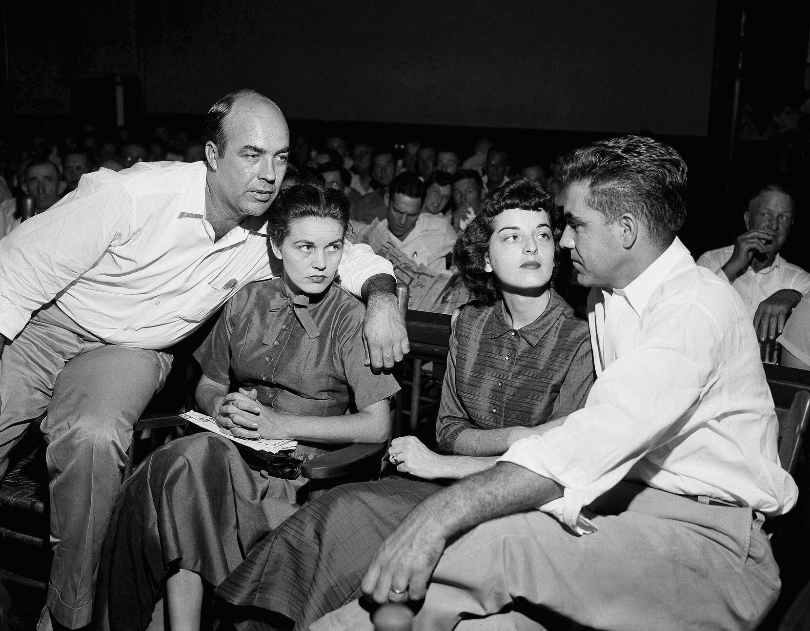 FILE - In this Sept. 23, 1955, file photo, J.W. Milam, left, his wife, second from left, Roy...