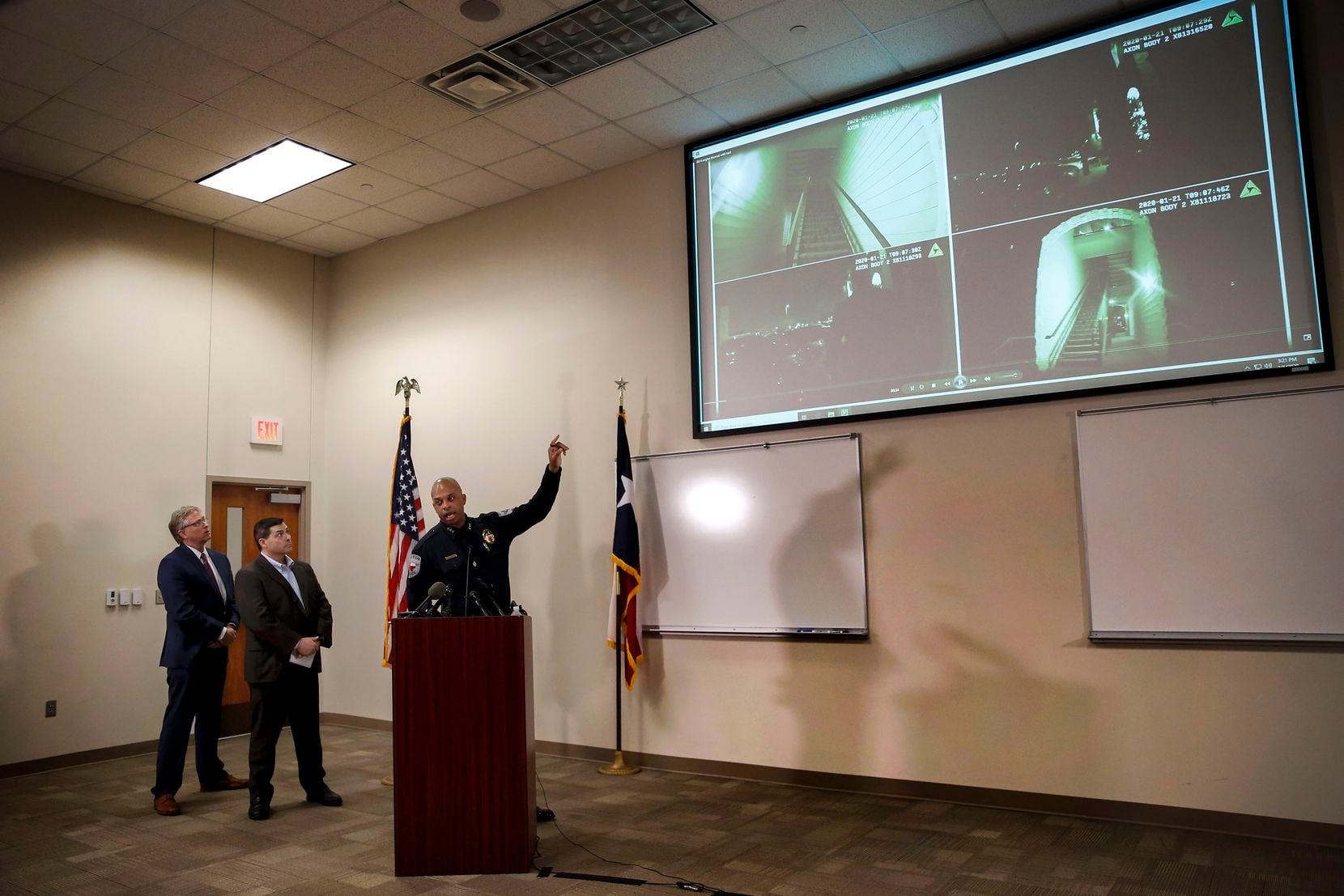 Denton Mayor Chris Watts, left, and City Manager Todd Hileman, center, and Police Chief Frank Dixon, right, watched body camera footage during a press conference regarding a January officer-involved shooting on Thursday, March 5, 2020, at the Denton Public Safety Training Center in Denton, Texas. (Ryan Michalesko/The Dallas Morning News)
